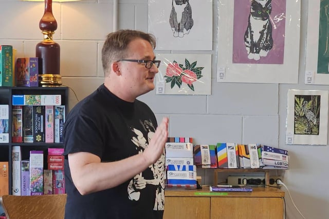 photo of mike bockoven talking at Sower Books for his come knocking author event